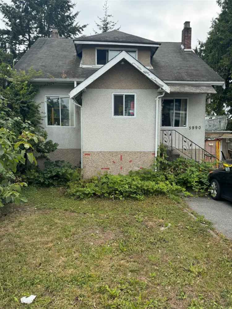 For Sale Charming House in Burnaby with Duplex Lot and Future Potential