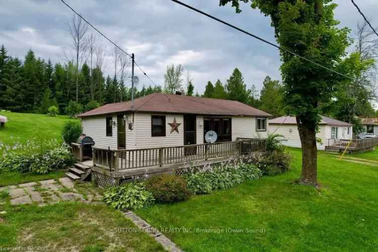 Buy Cottage on Chesley Lake with Water View and Three Bedrooms