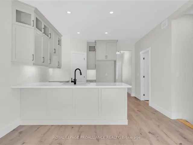 All Brick Bungalow with Quartz Countertops and Ensuite