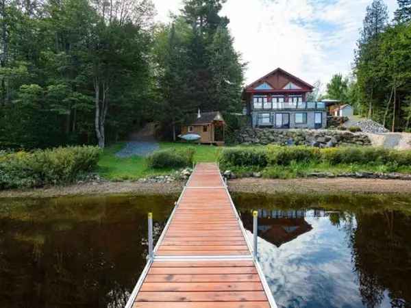 2-Bedroom Log Home with Open Basement and Fireplace