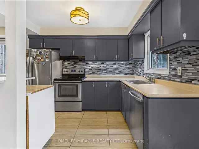 Bright 3-Bedroom Home with Finished Basement In-Law Suite Near Square One