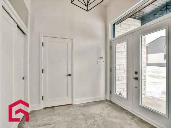 New Two-Story House with Double Garage for Sale in Saint-Eustache
