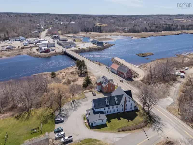 Buy historic hotel in Weymouth Nova Scotia with dining room and outdoor access