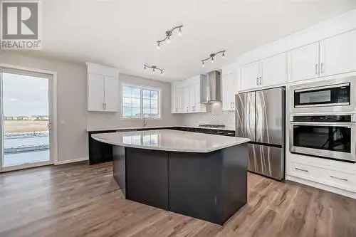 New Estate Home Backing Pond Cityscape Calgary