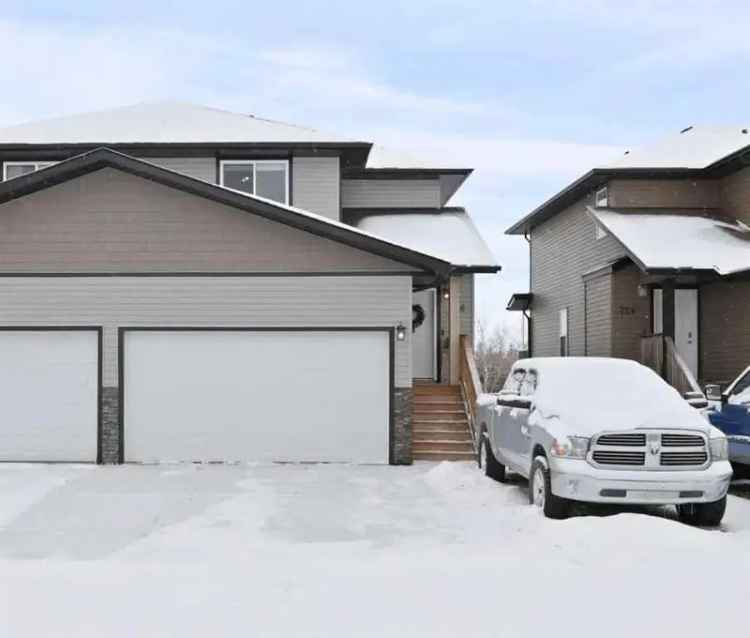 Family Home with Attached Garage and Large Backyard