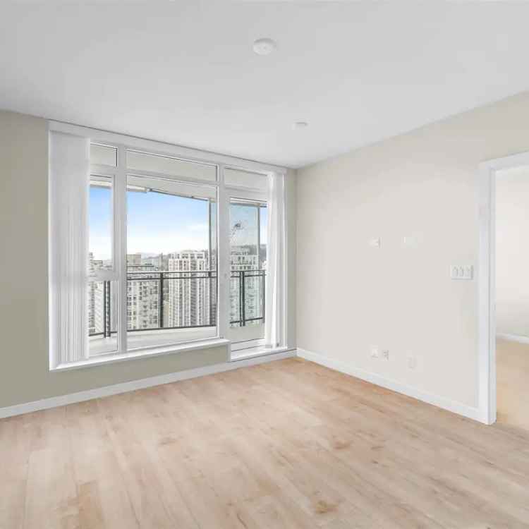 For Sale: Modern 2 Bedroom Apartment in Coquitlam Near Amenities