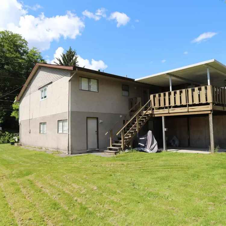 Buy Fourplex in Downtown Squamish with Development Potential