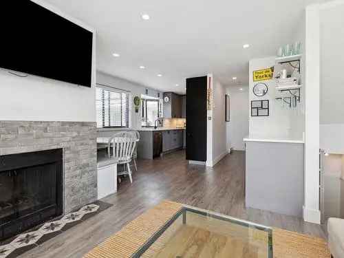 Kitsilano Townhouse For Sale 2 Beds 1.5 Baths Rooftop Deck
