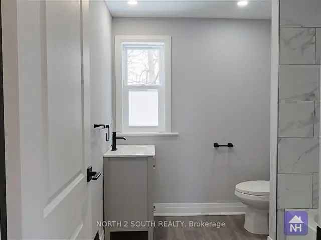 Downtown 4-Bedroom Renovated Brick Home