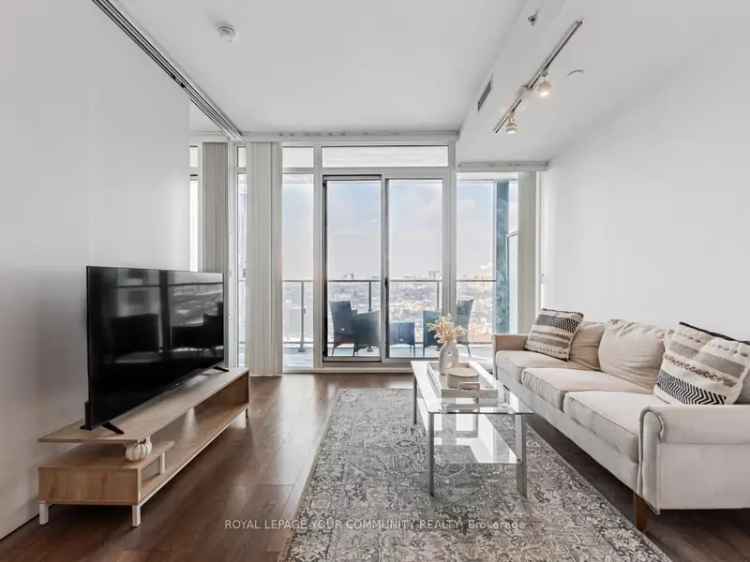 Rent upscale condo in the Entertainment District with parking and views