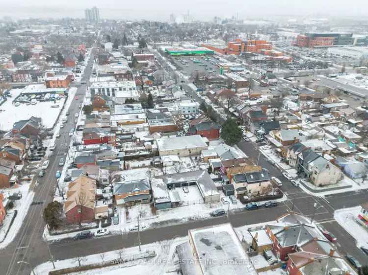 Hamilton Development Opportunity: Prime 2040SF Parcel with Storage Units