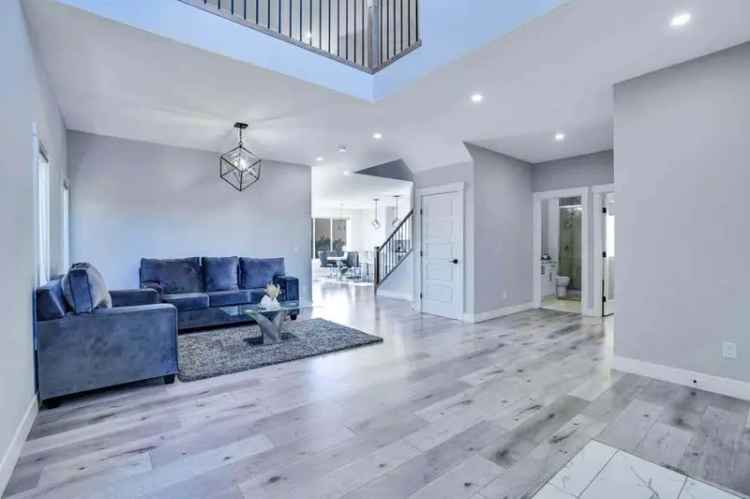 Buy House in Chestermere with Luxury Features and Spacious Living