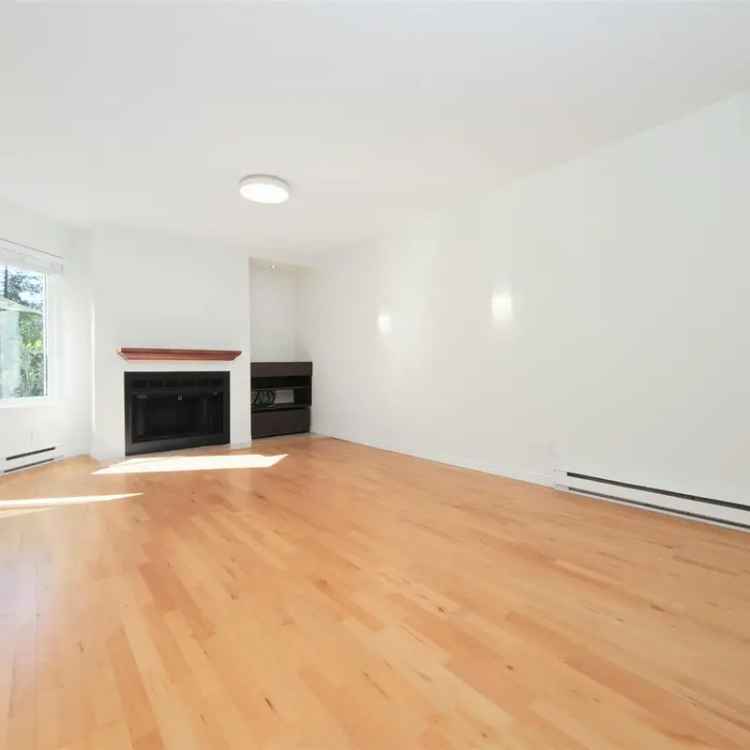 Updated 3 Bed Townhome with Sunny Yard and 2 Car Parking