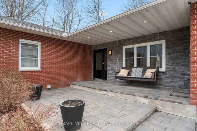 Newly Renovated 6-Acre Brick Bungalow with Pool & Garages