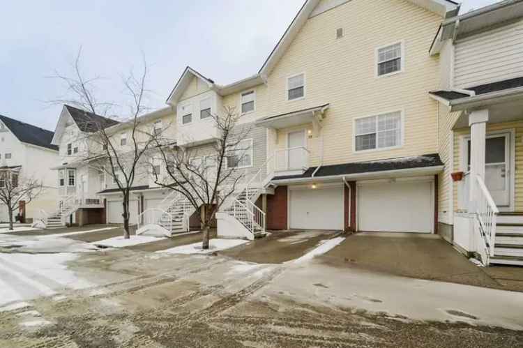 Buy Family Condo in McKenzie Towne with Yard and Garage