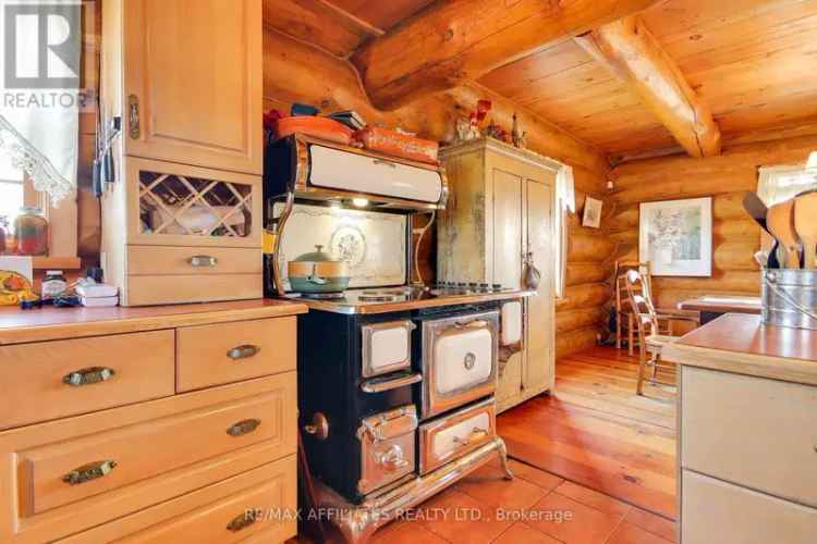 Buy custom log home with 53 acres near Brockville and St Lawrence River