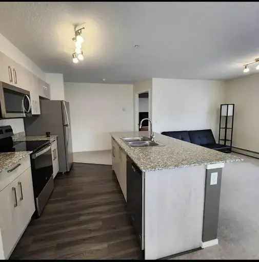 Rent Corner Unit Condo in Calgary with 2 Bedrooms and Great Amenities