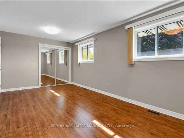 Charming Brick Bungalow with Renovated Main Floor and Spacious Basement