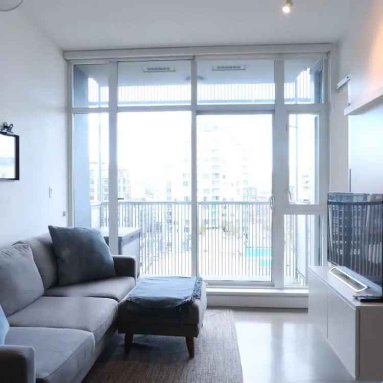 1 Bed + Den Corner Unit in Olympic Village