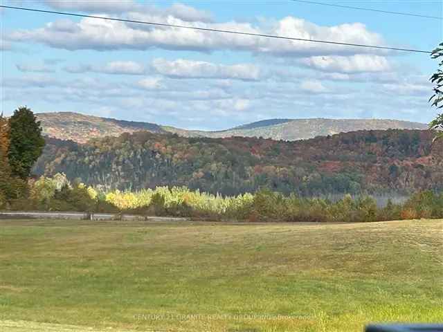 Executive Log Home with Acreage and Stunning Views