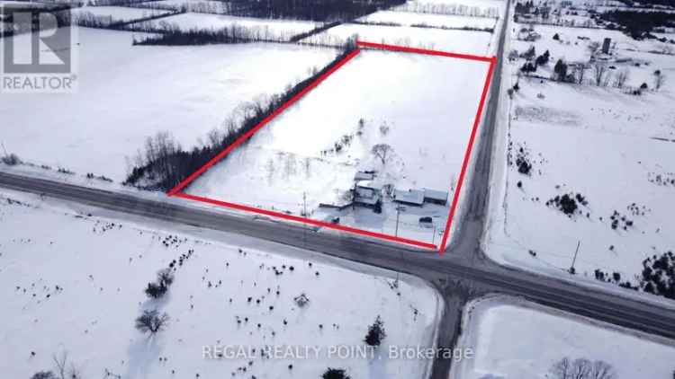 11 Acre Lot with Residential and Commercial Buildings Near Highway 401