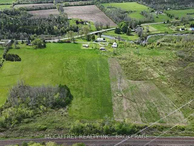 Rustic Charm Meets Modern Convenience: 25-Acre Homestead