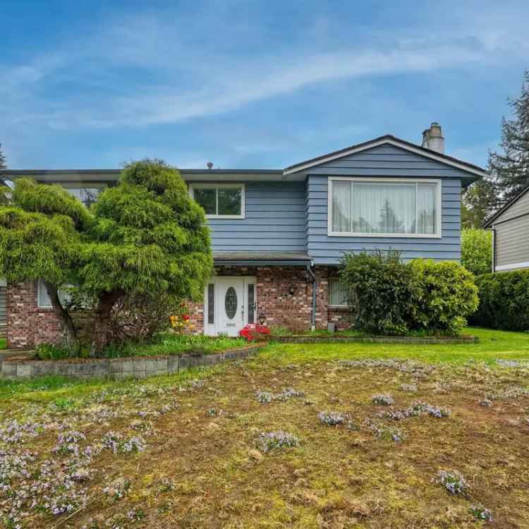 House for Sale: 3 Bed, 2 Bath Basement Entry Home with Lane Access