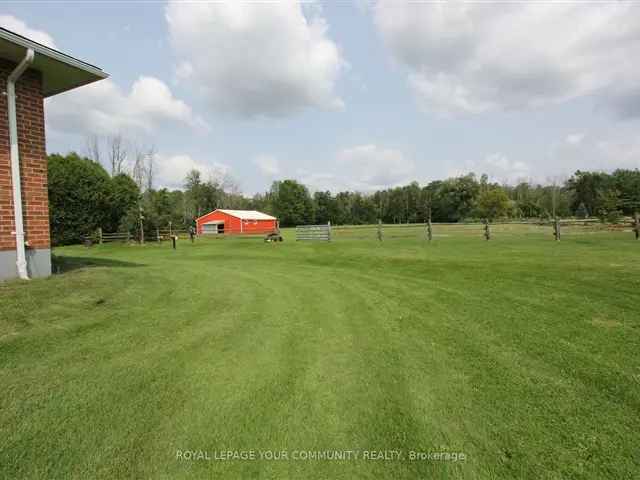 4.56 Acre Ranch Bungalow w Oversized Garage Huge Barn