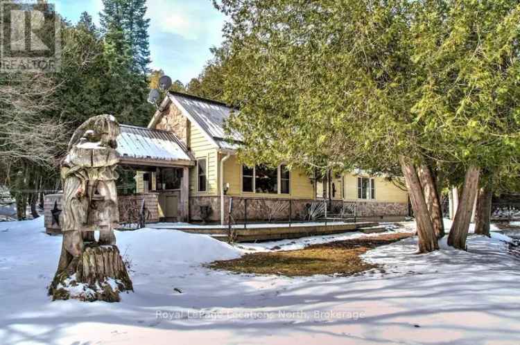 Riverfront Retreat near Creemore with Guest Cottage and Garage