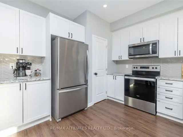 Spacious 3-Bedroom Townhouse with Granite Counters and Finished Basement