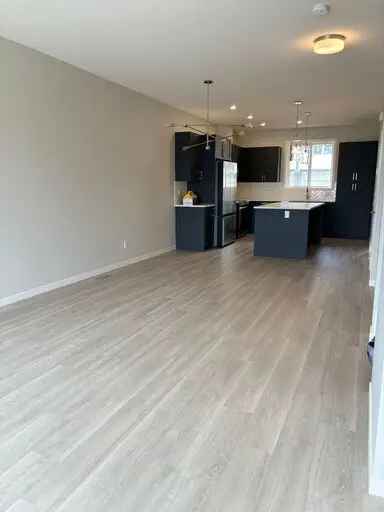 Rent Two Storey Townhouse in South Airdrie with Backyard and Parking