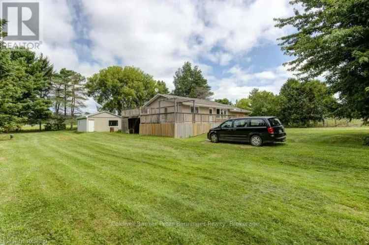 Rural 2-Bedroom Home with Detached Garage and Updated Features