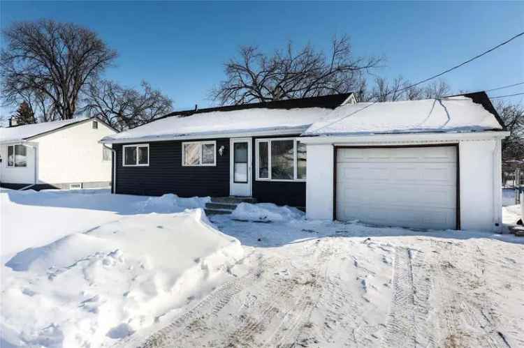 Buy house in Winnipeg with garage and modern upgrades