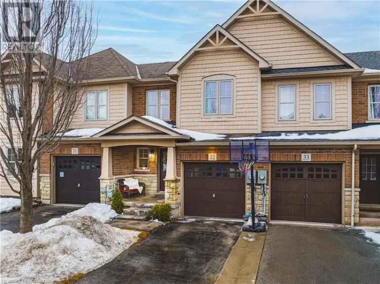 Buy townhouse in Binbrook with modern finishes and private backyard