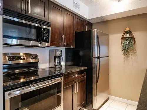 Condo For Sale in McConachie Area Edmonton with Nature View and 2 Parking