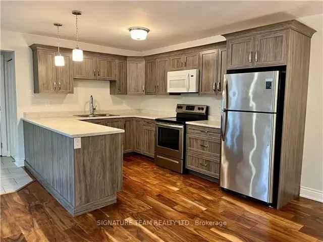 Hardwood Semi-Detached Home 2 Beds 2 Baths Low Maintenance