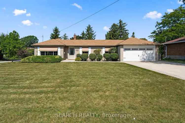 Spacious Brick Bungalow on Oversized Lot with Pool