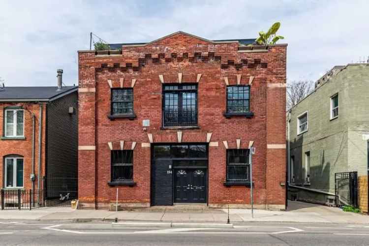 Historic Coach House Boasting Hard Loft Vibes in Moss Park Asks $4.2M