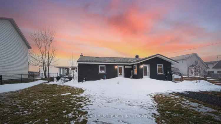 Buy waterfront home in Lake Erie with stunning views and sunroom