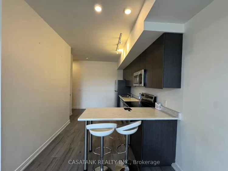 Buy Townhome in North Oakville with Rooftop Terrace and Modern Features