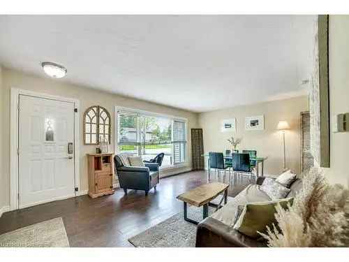 Updated 3-Level Side Split Home with 972 Sq Ft Drive-Through Garage