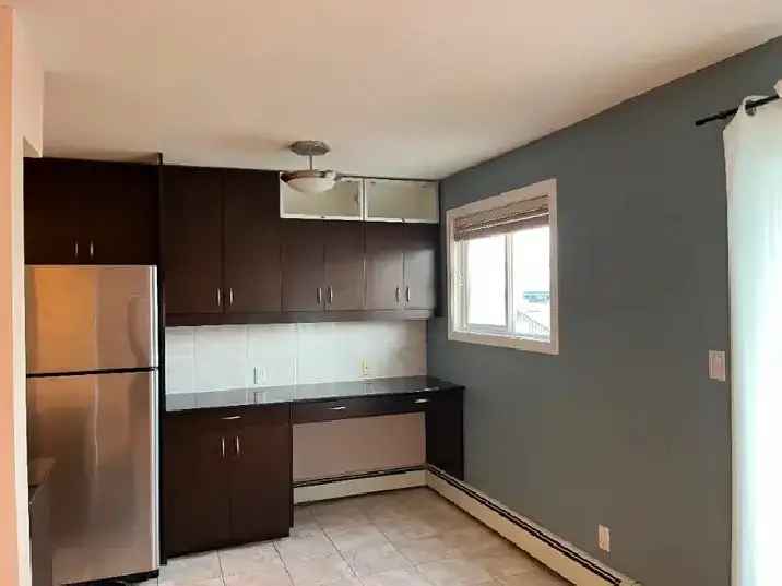 Sunalta 1 bedroom condo,parkg, laundry , $1575/m electricity