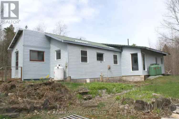 Country Home on 6.5 Wooded Acres Near Bancroft