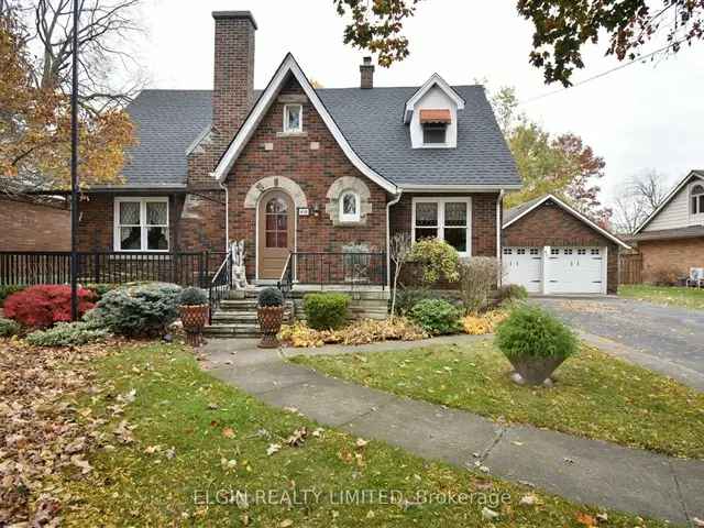 Charming 1938 Tudor Cottage Home with Large Garage and Park-like Yard