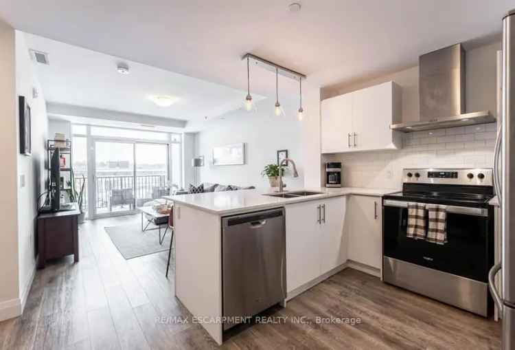 Spacious 1-Bed Condo 673 sq ft Balcony Quartz Countertops Parking