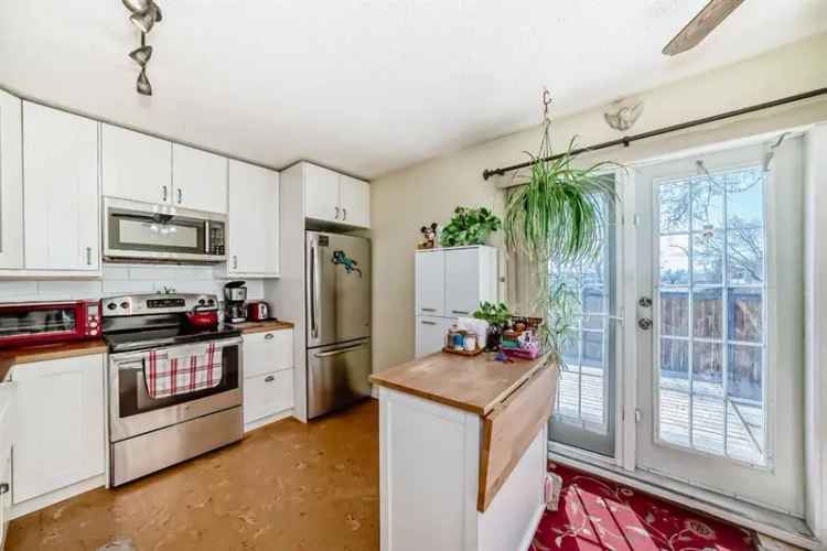 3 Bed 1.5 Bath End Unit with Finished Basement Parking and Mountain Views