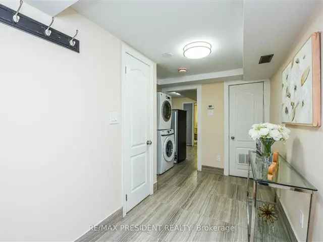 Leslieville Duplex: Renovated Freehold Townhouse with Two Kitchens