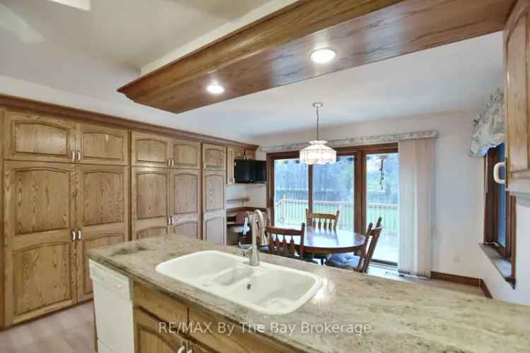Wasaga Beach All Brick Raised Bungalow  Triple Car Garage Finished Basement