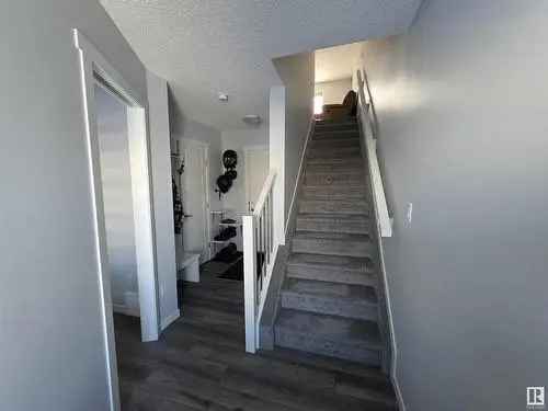 Buy row house in Uplands Edmonton with modern features and low maintenance