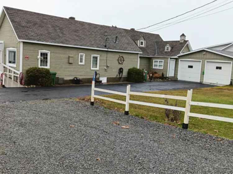 One-and-a-half-storey house for sale, 474, Route 132 E., Sainte-Luce - Proprio Direct